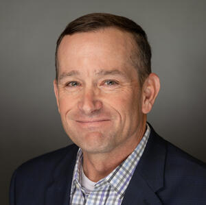 Portrait of Tim Perkins, Fractional CIO and CTO providing technology strategy and advisory services